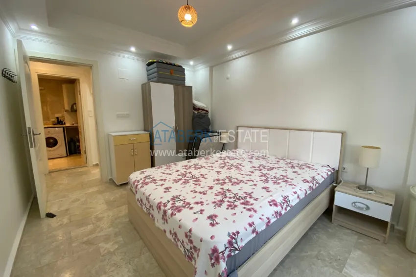 Purchase 2+1 apartment with furniture and access to the garden in the Avsallar area 23