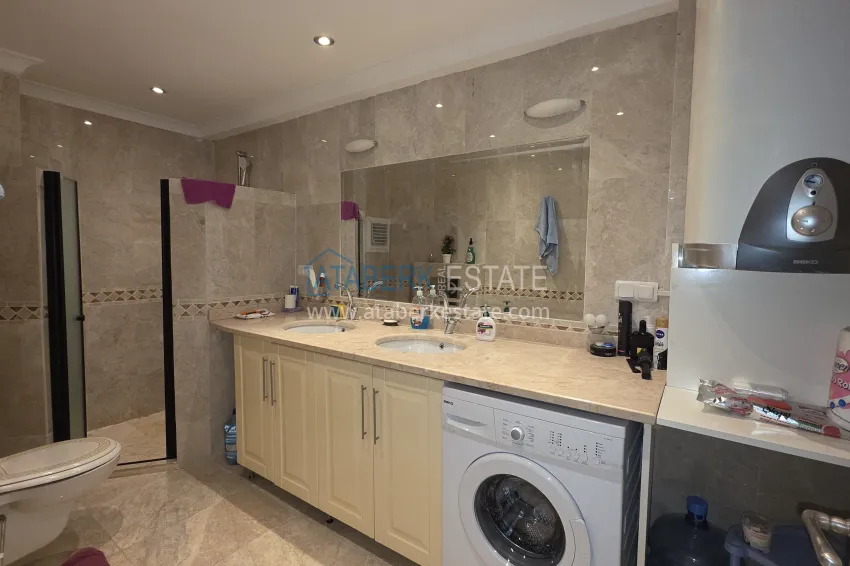 Purchase 2+1 apartment with furniture and access to the garden in the Avsallar area 24