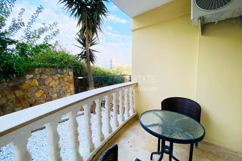 Purchase 2+1 apartment with furniture and access to the garden in the Avsallar area 28