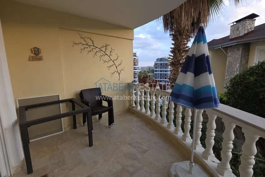 Purchase 2+1 apartment with furniture and access to the garden in the Avsallar area 29