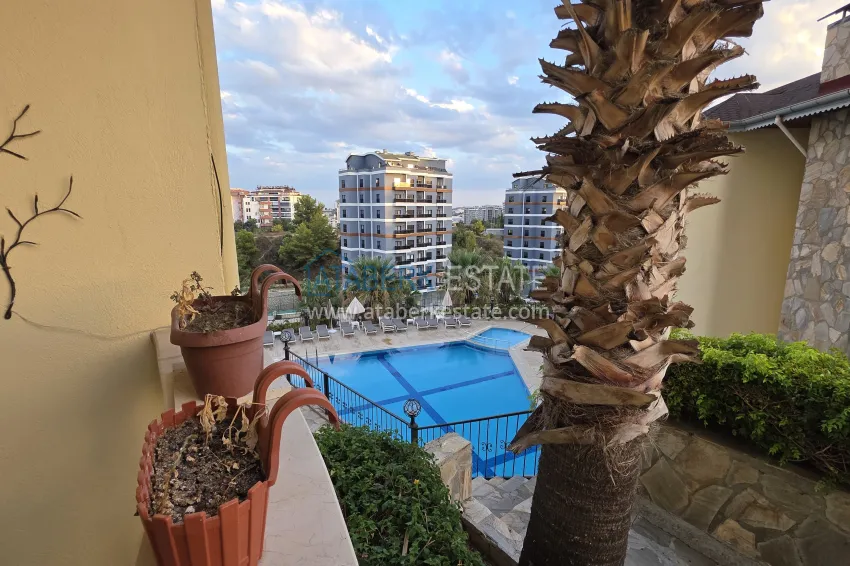 Purchase 2+1 apartment with furniture and access to the garden in the Avsallar area 31