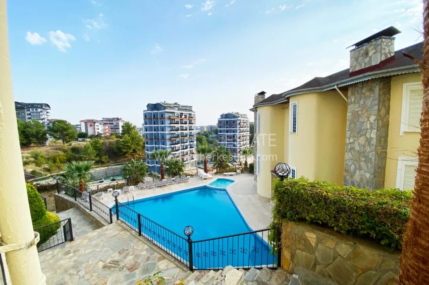 Purchase 2+1 apartment with furniture and access to the garden in the Avsallar area 32