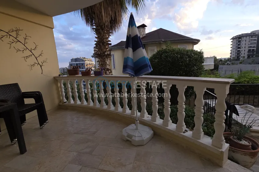 Purchase 2+1 apartment with furniture and access to the garden in the Avsallar area 33