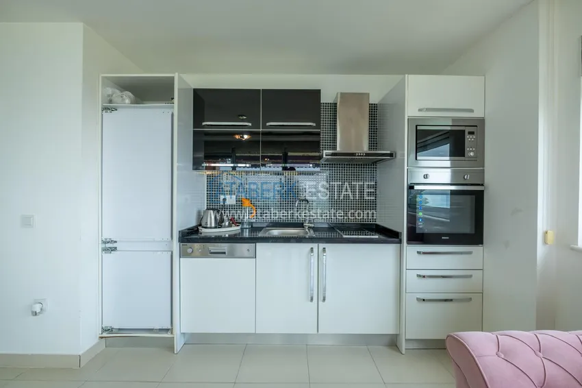 Purchase Квартира 1+1 на первой линии в Алании район Кестель – с мебелью и панорамный вид на море 6 