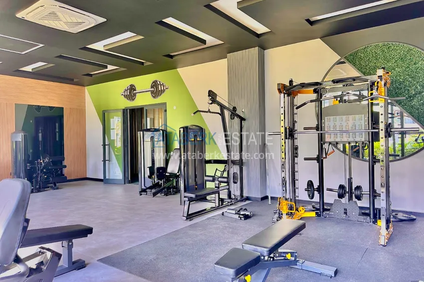 Дуплекс-пентхаус 2+1 с дизайнерским ремонтом в премиальном комплексе в Алании, район Оба 21 