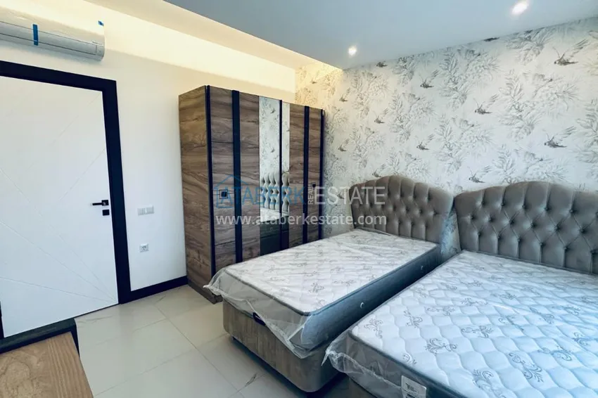 Purchase  Дуплекс-пентхаус 2+1 с дизайнерским ремонтом в премиальном комплексе в Алании, район Оба 8 