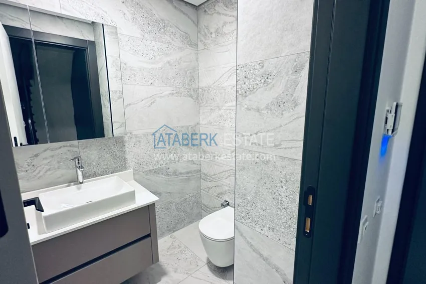 Purchase  Дуплекс-пентхаус 2+1 с дизайнерским ремонтом в премиальном комплексе в Алании, район Оба 9 