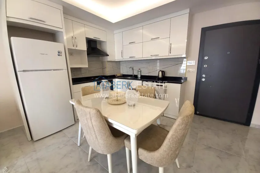 Purchase Двухкомнатная квартира в центре Махмутлара - 250 метров до моря 5 