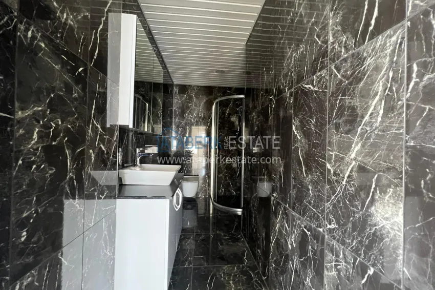 Purchase Penthouse duplex 3+2 with open sea views in Mahmutlar. Citizenship Real Estate 12