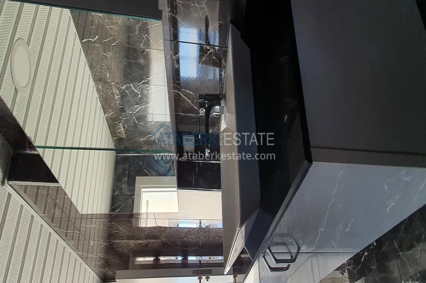 Purchase Penthouse duplex 3+2 with open sea views in Mahmutlar. Citizenship Real Estate 14