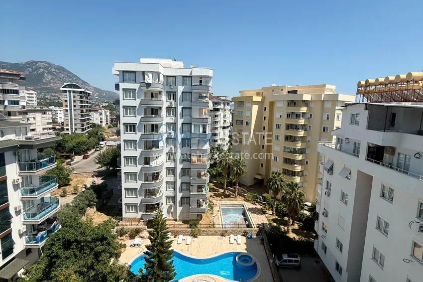 2+1 apartment in Tosmur - furnished, with sea and mountain views, suitable for a residence permit 2 