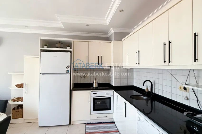 Purchase  2+1 apartment in Tosmur - furnished, with sea and mountain views, suitable for a residence permit 8 