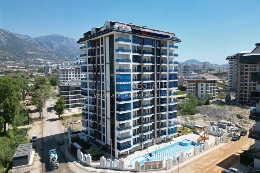 1+1 apartment with mountain views in Mahmutlar - Saturday market area 3 