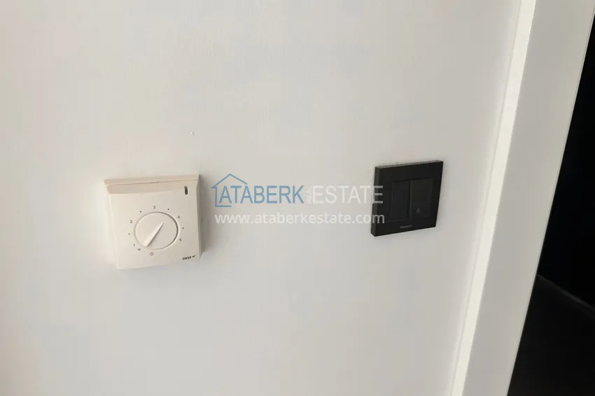 Purchase 2+1 apartment with sea view in Kargicak on the beachfront 11