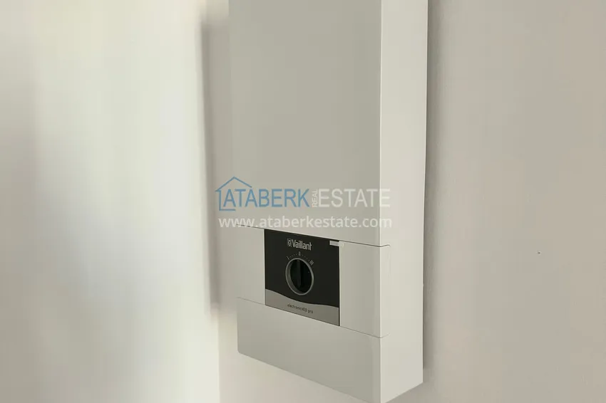 Purchase 2+1 apartment with sea view in Kargicak on the beachfront 12