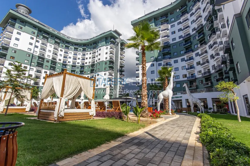 Furnished three-room apartment in Mahmutlar — in a resort-style complex 12