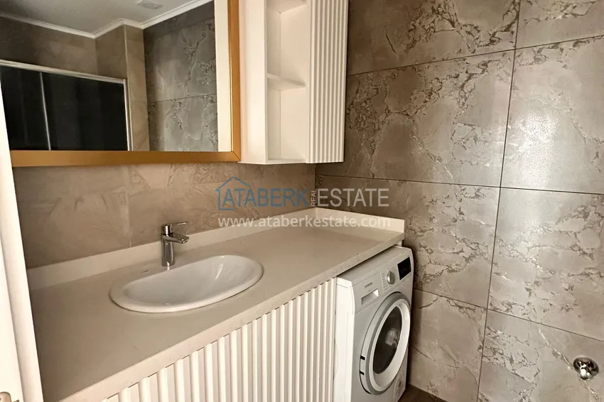 Purchase 2+1 apartment with sea view in Kargicak on the beachfront 13