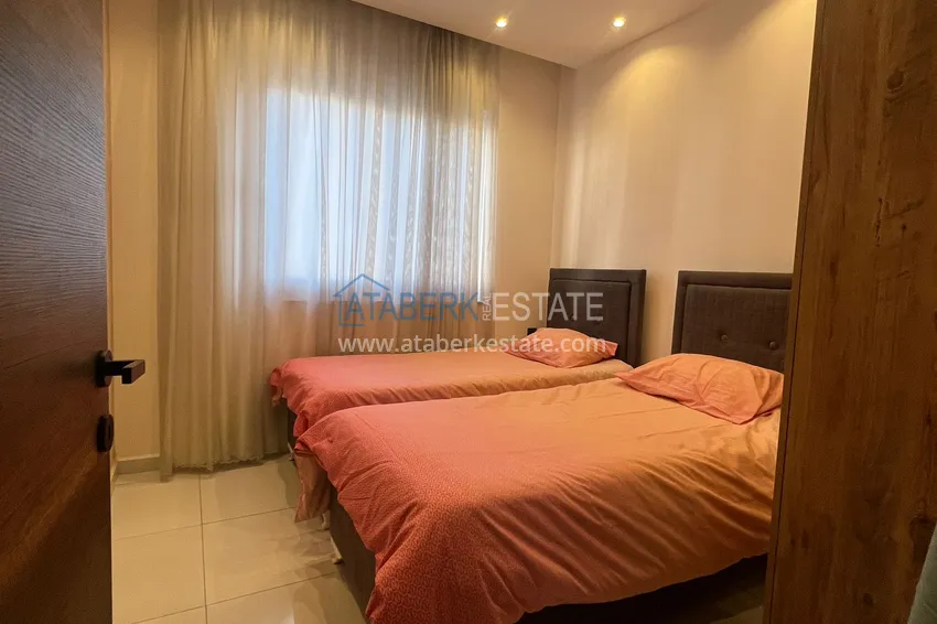 Purchase Furnished three-room apartment in Mahmutlar — in a resort-style complex 14