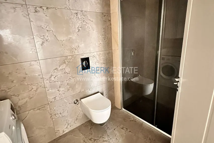 Purchase 2+1 apartment with sea view in Kargicak on the beachfront 14