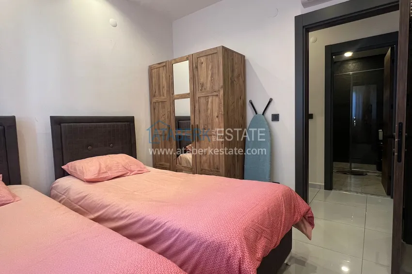 Purchase Furnished three-room apartment in Mahmutlar — in a resort-style complex 15