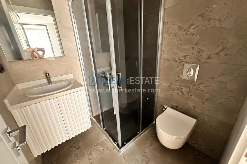 Purchase 2+1 apartment with sea view in Kargicak on the beachfront 15