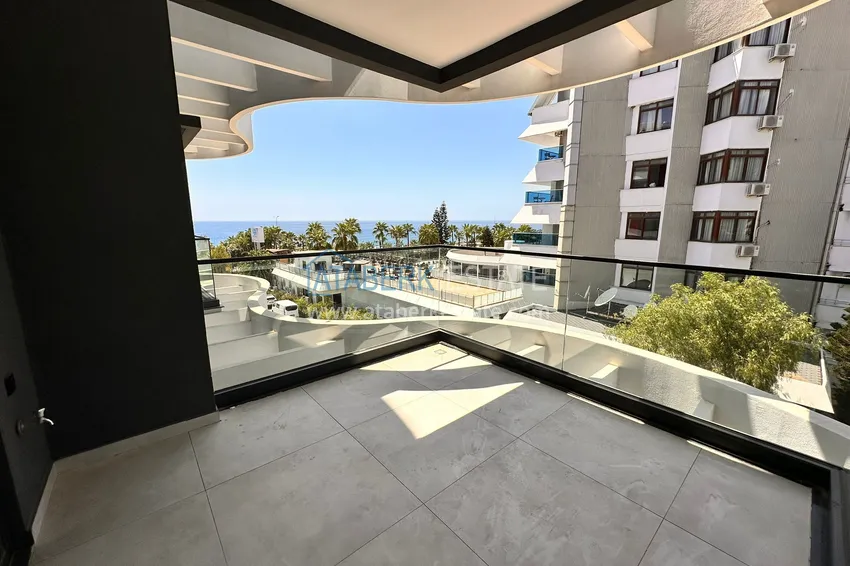 Purchase 2+1 apartment with sea view in Kargicak on the beachfront 17