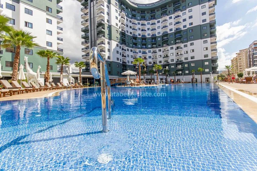 Furnished three-room apartment in Mahmutlar — in a resort-style complex 17