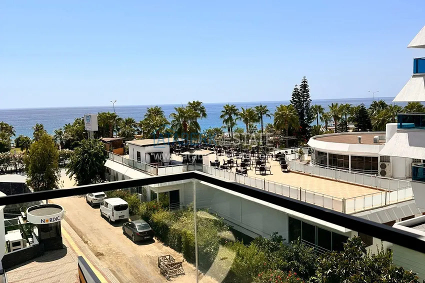 Purchase 2+1 apartment with sea view in Kargicak on the beachfront 18