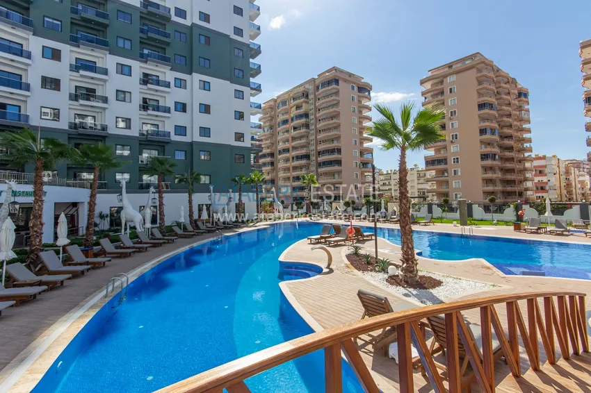 Furnished three-room apartment in Mahmutlar — in a resort-style complex 20