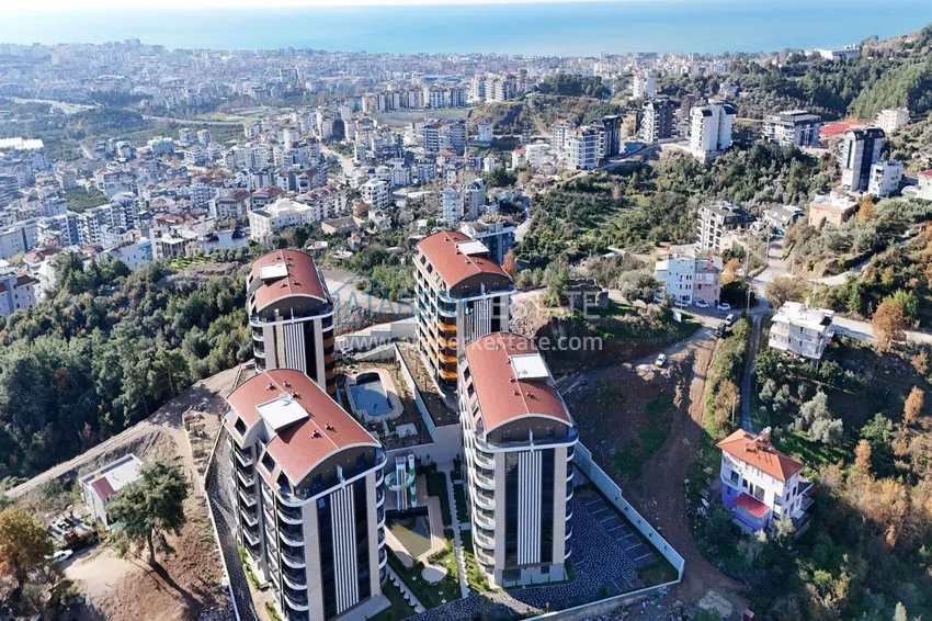 A new stylish investment project at the excavation stage in Oba, Alanya 1 