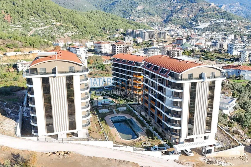 A new stylish investment project at the excavation stage in Oba, Alanya 8 