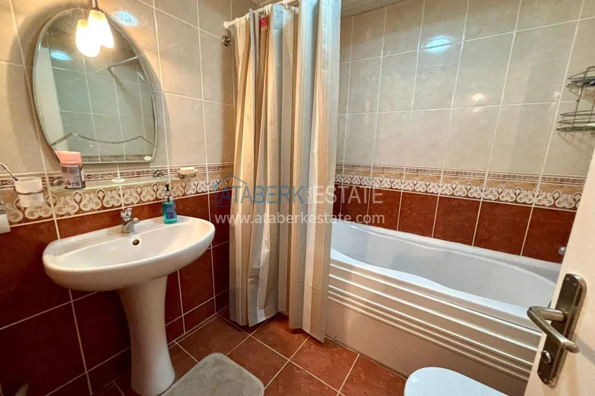 Purchase  Furnished 2+1 apartment in Mahmutlar on the beachfront  12 