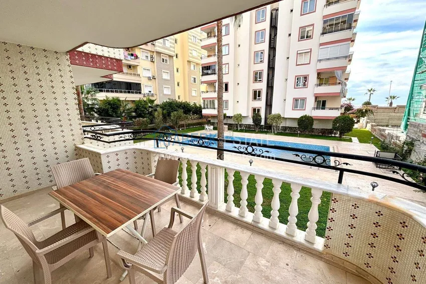 Purchase  Furnished 2+1 apartment in Mahmutlar on the beachfront  14 