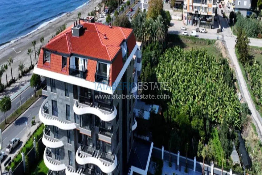 1+1 apartment overlooking the sea and the fortress on the beachfront in Kestel 4 