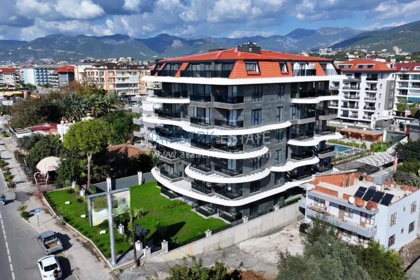 1+1 apartment overlooking the sea and the fortress on the beachfront in Kestel 10 