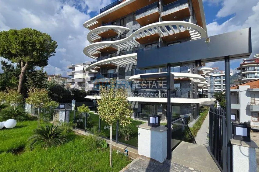 1+1 apartment overlooking the sea and the fortress on the beachfront in Kestel 14 