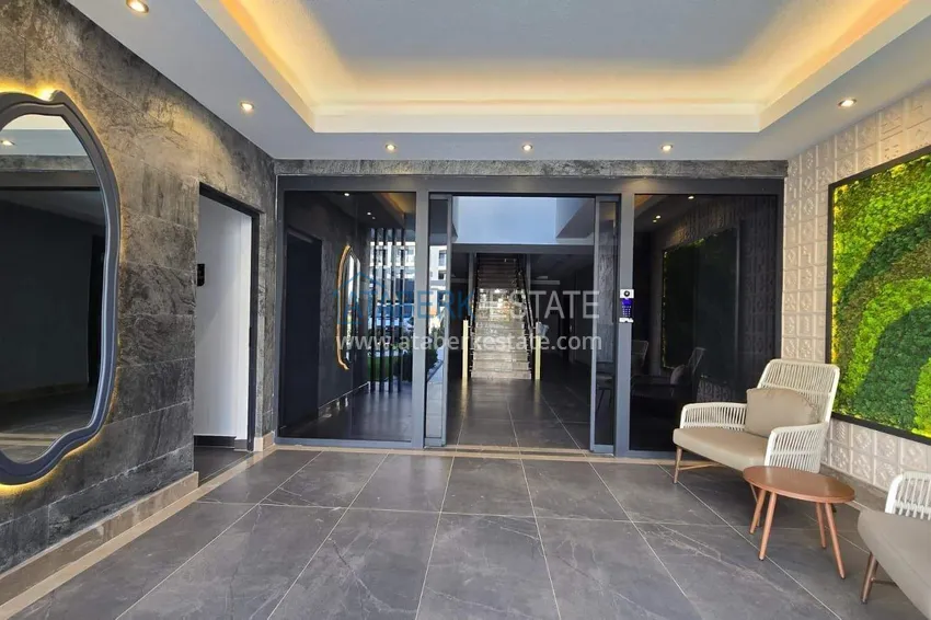 1+1 apartment overlooking the sea and the fortress on the beachfront in Kestel 28 