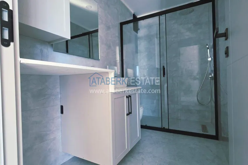 Purchase  1+1 apartment overlooking the sea and the fortress on the beachfront in Kestel 3 