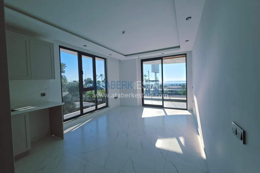 Purchase  1+1 apartment overlooking the sea and the fortress on the beachfront in Kestel 4 