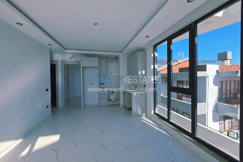 Purchase  1+1 apartment overlooking the sea and the fortress on the beachfront in Kestel 5 