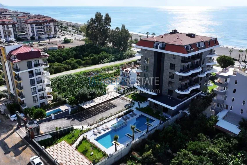 1+1 apartment overlooking the sea and the fortress on the beachfront in Kestel 6 