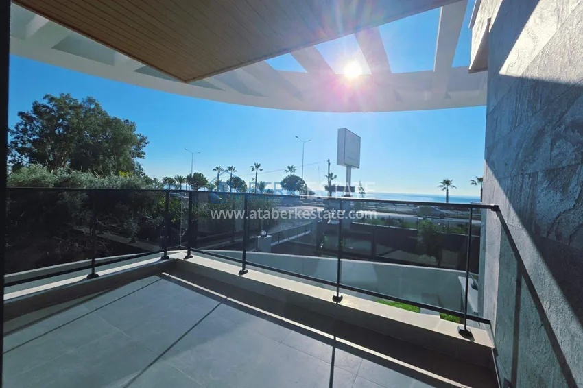 Purchase  1+1 apartment overlooking the sea and the fortress on the beachfront in Kestel 7 