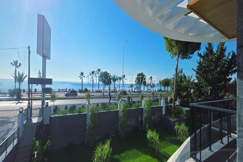 Purchase  1+1 apartment overlooking the sea and the fortress on the beachfront in Kestel 9 