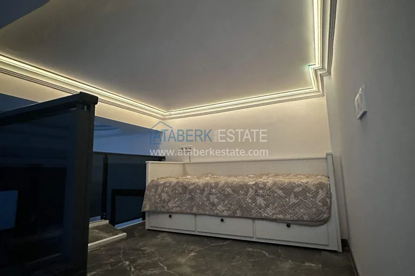 Purchase 2+1 penthouse duplex with sea view in the center of Mahmutlar - installments of up to 12 months are possible 18 