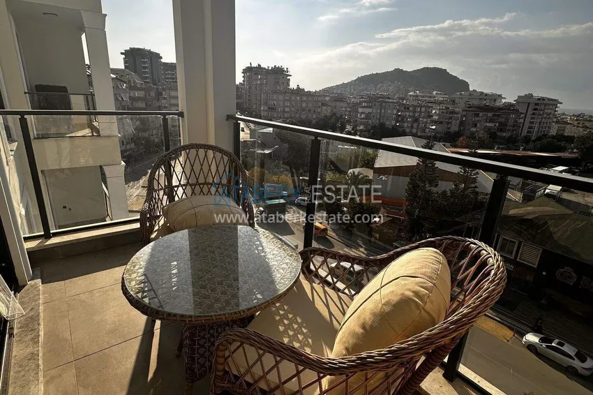 Purchase  1+1 apartment in the center of Alanya - furnished and with sea views, installments are available  14 
