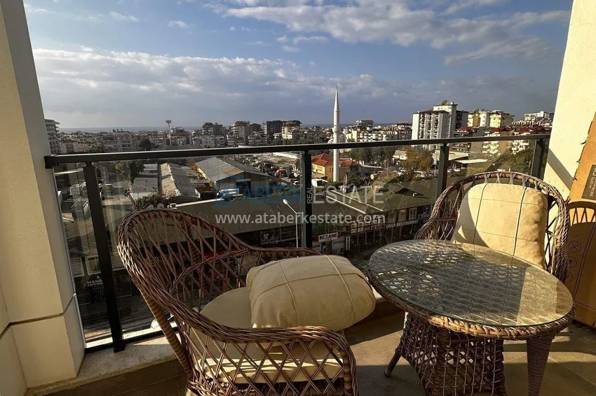 Purchase  1+1 apartment in the center of Alanya - furnished and with sea views, installments are available  15 