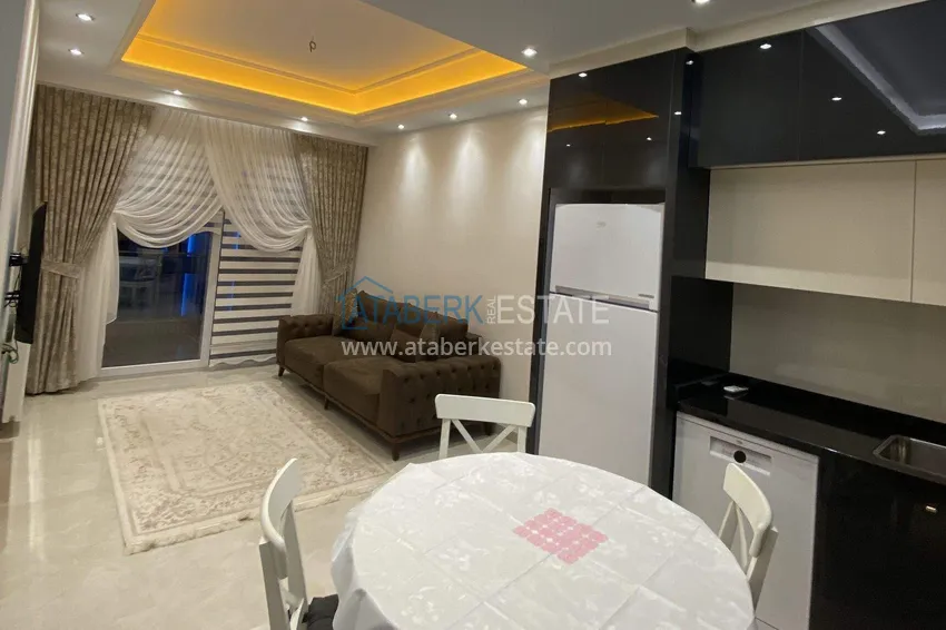 Purchase  1+1 apartment 70 m² in the center of Mahmutlar — furnished, glazed balcony, installments up to 1 year 2 