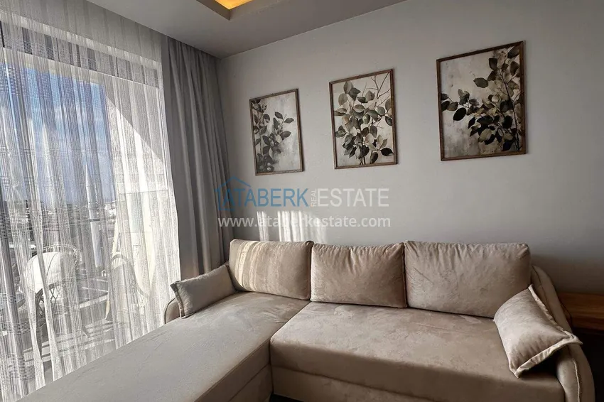 Purchase  1+1 apartment in the center of Alanya - furnished and with sea views, installments are available  3 
