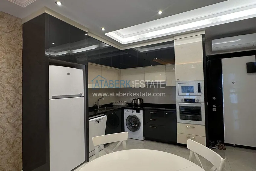 Purchase  1+1 apartment 70 m² in the center of Mahmutlar — furnished, glazed balcony, installments up to 1 year 5 