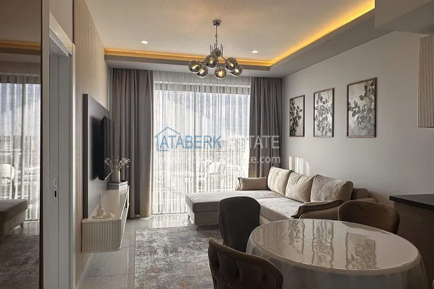 Purchase  1+1 apartment in the center of Alanya - furnished and with sea views, installments are available  9 